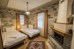 Posteľ alebo postele v izbe v ubytovaní Gaia Guesthouse