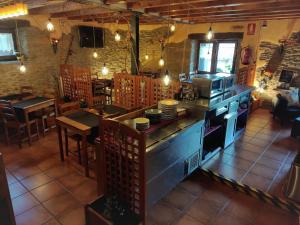 an overhead view of a kitchen in a restaurant at Lo Paller de Roc in Montescladó