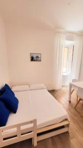 a bedroom with a large bed in a room at MARÈ Terracina Apartments in Terracina +60 photos