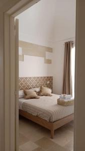מיטה או מיטות בחדר ב-M&G Suite Home