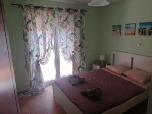 Postel nebo postele na pokoji v ubytování ASTERIDE