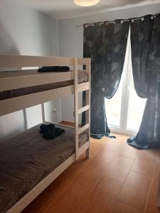 Postel nebo postele na pokoji v ubytování ASTERIDE