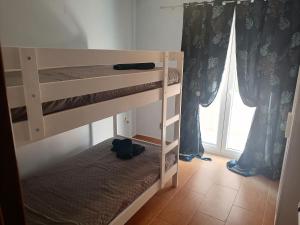 Postel nebo postele na pokoji v ubytování ASTERIDE