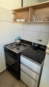 Köök või kööginurk majutusasutuses Departamento monoambiente en pleno centro de Jujuy ideal para 1 o 2 personas