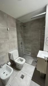 Vannituba majutusasutuses Departamento monoambiente en pleno centro de Jujuy ideal para 1 o 2 personas +7 fotot