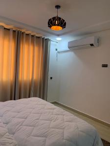 Hotel la Perle d'Arfoud客房内的一张或多张床位