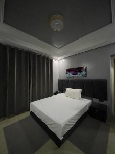 Hotel la Perle d'Arfoud客房内的一张或多张床位