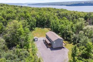 an overhead view of a house in the woods at Large Home Sleeps 24! Dogs Ok! in Lansing