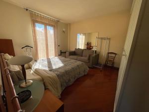 מיטה או מיטות בחדר ב-Villa Duomo Mare