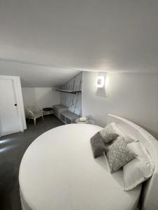 Postel nebo postele na pokoji v ubytování Rooftop 19_Amalfi Luxury Suite