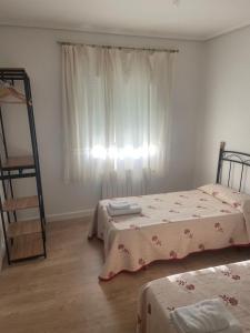 A bed or beds in a room at AT SAN MIGUEL o