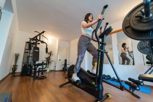 Fitness centrum a/nebo fitness zařízení v ubytování Hotel Apollo