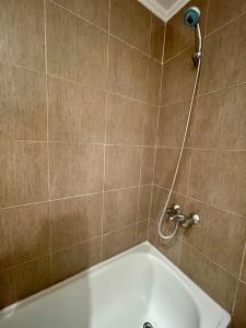 Vannituba majutusasutuses Hakuna Matata - Departamento centrico para 2 personas, con cochera