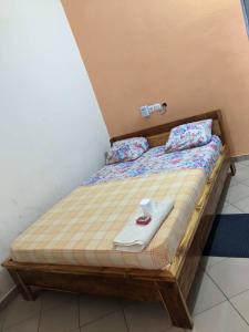 Cama o camas de una habitación en BM Akwaba