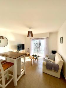 Televiisor ja/või meelelahutuskeskus majutusasutuses Hakuna Matata - Departamento centrico para 2 personas, con cochera