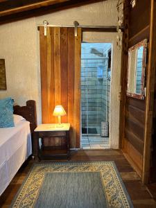 Postel nebo postele na pokoji v ubytování Hotel Pousada Praia do Farol