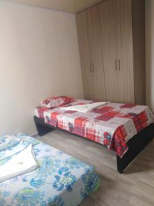 Postel nebo postele na pokoji v ubytování Acogedor Apartamento Arboleda del Campestre