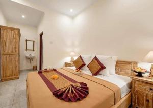 Кровать или кровати в номере Ditha Guest House