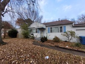 a house with a pile of leaves in front of it at VA Beach Zen retreat house in Virginia Beach