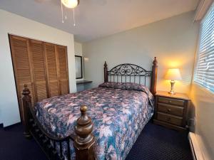 Ένα ή περισσότερα κρεβάτια σε δωμάτιο στο Redford Motel