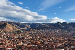 an aerial view of a city in the mountains at Casa Mirador SanBlas in Cusco