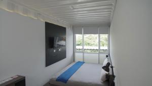 My Dormy Hostel UMM房間的床