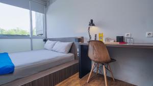 My Dormy Hostel UMM房間的床