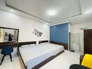Zan HomeStay客房内的一张或多张床位