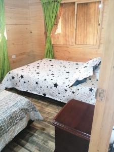 Postel nebo postele na pokoji v ubytování Finca Severo Refugio