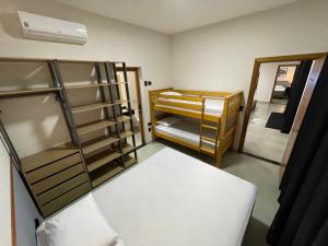 Cantinho Estrelado - Casa automatizada com ALEXA客房内的一张或多张床位