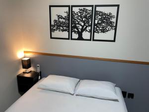 Cantinho Estrelado - Casa automatizada com ALEXA客房内的一张或多张床位