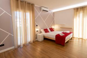Postel nebo postele na pokoji v ubytování B&B Villa Pignataro