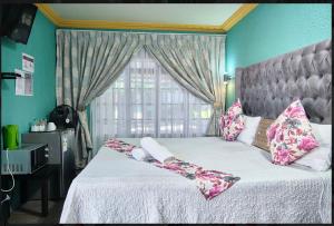 Кровать или кровати в номере Oleratong Guest House