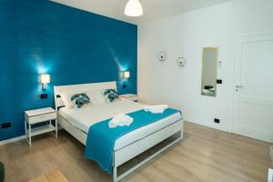 Postel nebo postele na pokoji v ubytování B&B Villa Pignataro