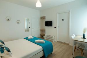Postel nebo postele na pokoji v ubytování B&B Villa Pignataro