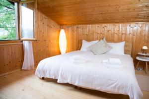 Postel nebo postele na pokoji v ubytování 5 room house Joch Churwalden- Lenzerheide