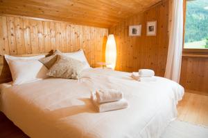 Postel nebo postele na pokoji v ubytování 5 room house Joch Churwalden- Lenzerheide
