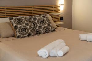 Postel nebo postele na pokoji v ubytování B&B Villa Pignataro