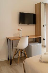TV a/nebo společenská místnost v ubytování B&B Villa Pignataro