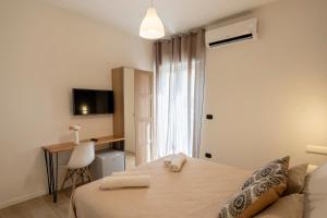 Postel nebo postele na pokoji v ubytování B&B Villa Pignataro