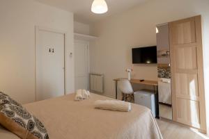 Postel nebo postele na pokoji v ubytování B&B Villa Pignataro