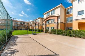 a basketball court in front of a building at Metro Scottsdale Apartments 1 bd 1 ba PREMIUM in Scottsdale