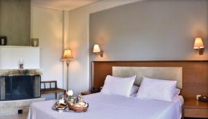 Postel nebo postele na pokoji v ubytování Hotel Pelion Resort