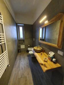 a bathroom with a sink and a toilet at VILLA MATILDA luxury B&B in Ischia