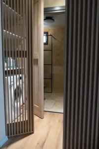 a view of a room with a staircase and a room with a room at Cosy 2 rooms apartment in the center of the city in Bucharest +50 photos