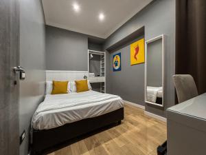 Postel nebo postele na pokoji v ubytování Tiè tiè