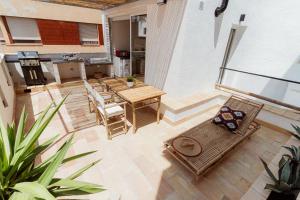 Dapur atau dapur kecil di Loft Alguer II con terraza, barbacoa y chimenea