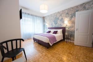A bed or beds in a room at B&B Roma 474