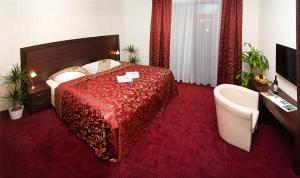 Łóżko lub łóżka w pokoju w obiekcie Hotel Princess