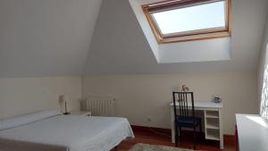 Łóżko lub łóżka w pokoju w obiekcie CASA TORRE DE GURIEZO